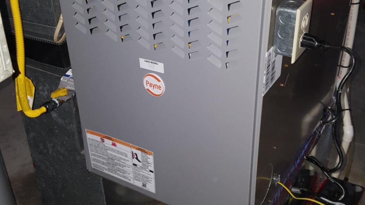 Payne furnace installed in a basement
