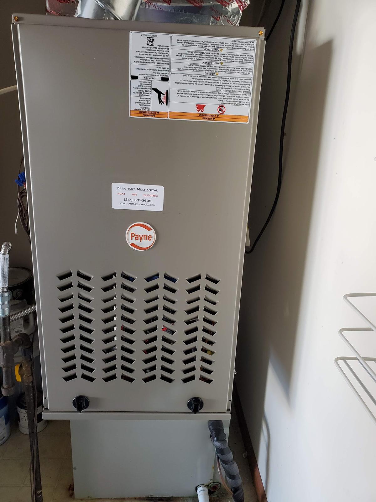 New Payne gas furnace installed in a utility closet