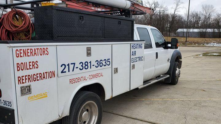 Klughart service truck lettered Heating, Air, Electric, Generators, Boilers, Refrigeration